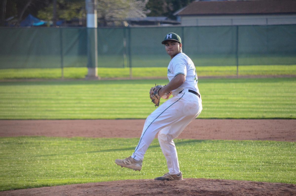 Junior Shaurya Jain prepares to pitch in a game against Pajaro Valley High School at Washington Park. He led the league with 96 strikeouts this season, helping the Eagles remain in contention for the league title.